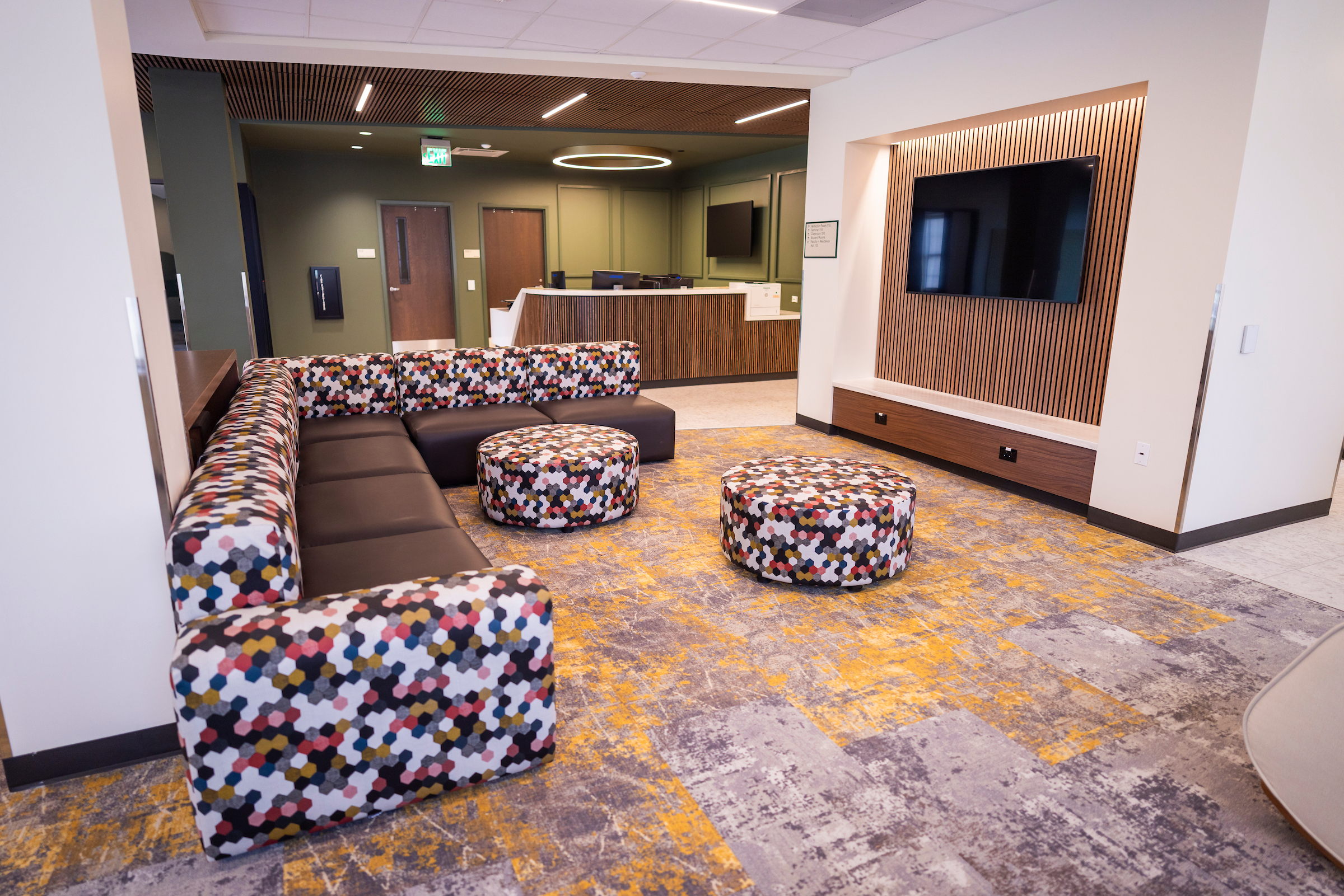 Dawson Lobby, consisting of couches, various other seating, a TV, a ping-pong table, and a piano (the latter 2 not pictured at this angle)