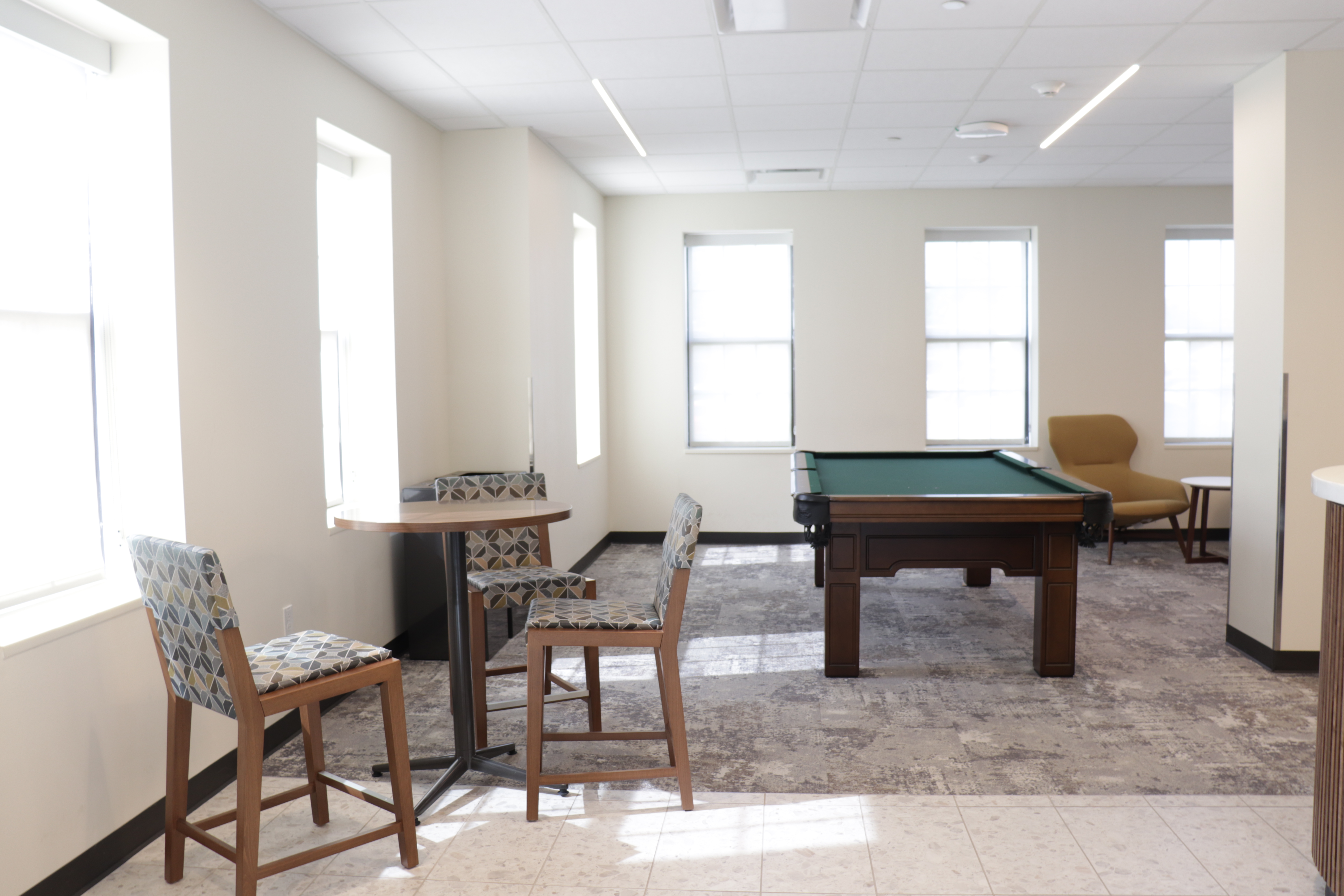 Allen Lobby table, chairs, and pool table.