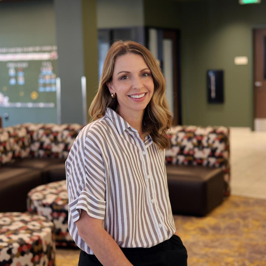 Headshot of Dr. Kelly Johnston in the Dawson Lobby.
